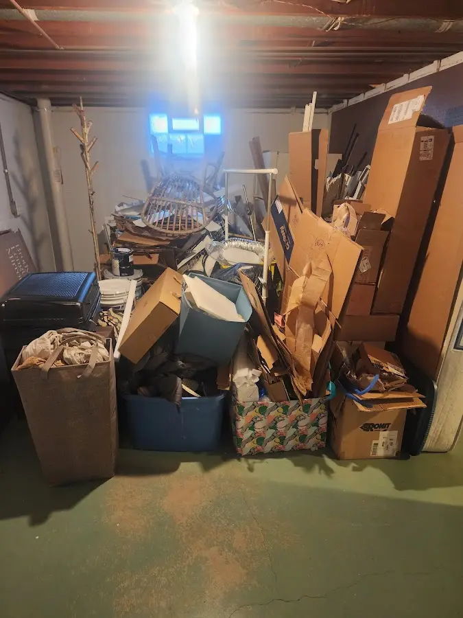 Roll-off dumpster container at job site for Construction Dumpster Rental in Hickam Housing